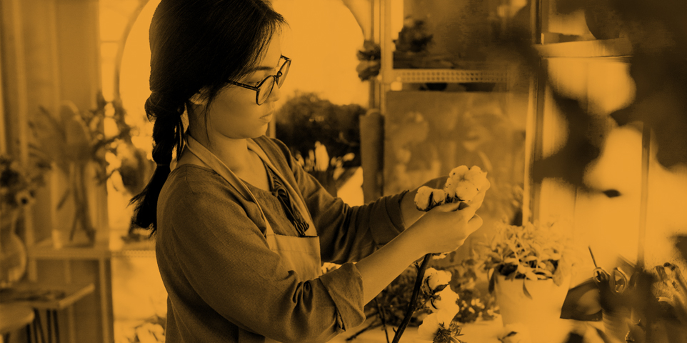 Florist holding flowers